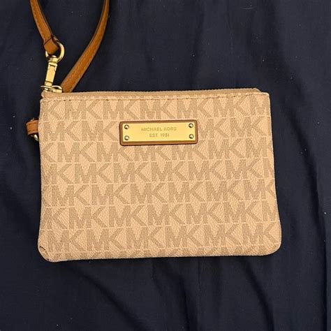 how much is a michael kors change purse worth|Michael Kors refund.